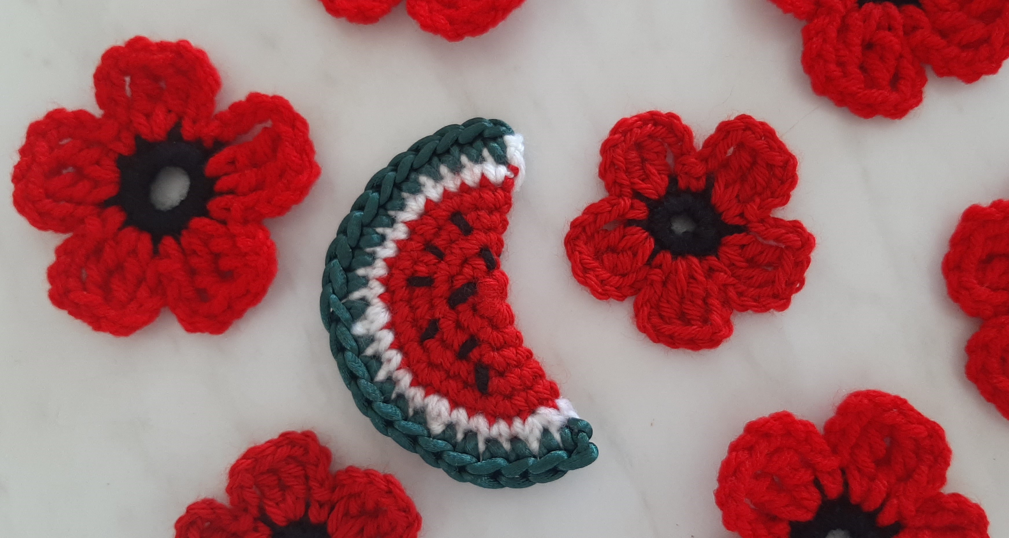 Crocheted sea anemone and watermelons